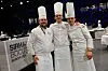 Team Norge i Bocuse d'Or 2025: Fra venstre coach Christopher W. Davidsen, kandidat Håvard Werkland og commis Grunde Gillund.