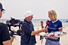 Norges sjømatråds utsending til USA, Katrine Rød Haraldsson blir intervjuet av  britiske Sky Sport på Miami Beach; «alle ville snakke norsk laks og Haaland».