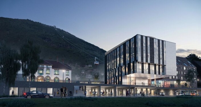 Nedre stasjon og gondol på Voss Jernbanestasjon. Den gamle stasjonsbygningen til venstre på bildet. (Illustrasjon: HLM Arkitekter). Nedre stasjon og gondol på Voss Jernbanestasjon. Den gamle stasjonsbygningen til venstre på bildet. (Illustrasjon: HLM Arkitekter).